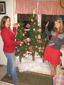 KellieAnn and sister Erica show of their Norwegian Christmas trees in December 2010.