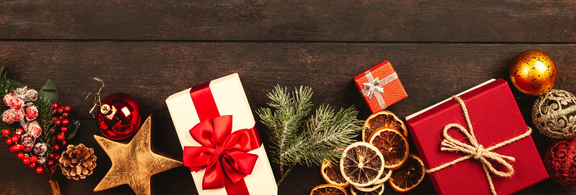 christmas gifts on brown parquet floor